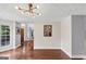 Dining room features hardwood floors and modern lighting at 1625 Clark Lake Nw, Acworth, GA 30102