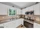 Kitchen features granite countertops and stainless appliances at 1625 Clark Lake Nw, Acworth, GA 30102