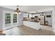 Eat-in kitchen features white cabinets and stainless steel appliances at 1625 Clark Lake Nw, Acworth, GA 30102