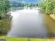 Breathtaking lake view, offering a tranquil and picturesque setting for relaxation and enjoyment at 1625 Clark Lake Nw, Acworth, GA 30102
