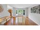 Living room featuring hardwood floors, neutral walls and a bay window bringing in natural light at 1625 Clark Lake Nw, Acworth, GA 30102
