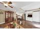Inviting living space boasting hardwood floors, a china cabinet, and an open kitchen with stainless appliances at 1625 Clark Lake Nw, Acworth, GA 30102