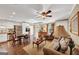 Bright living space featuring hardwood floors, neutral tones, and direct access to the outdoor patio at 1625 Clark Lake Nw, Acworth, GA 30102