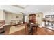 Inviting living space boasting hardwood floors, a china cabinet, and an open kitchen with stainless appliances at 1625 Clark Lake Nw, Acworth, GA 30102