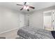 Bedroom featuring neutral walls, carpet, and a door to the bathroom at 155 Carrolls Way, Fayetteville, GA 30215