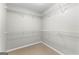 Walk-in closet featuring carpet flooring and wire shelving at 155 Carrolls Way, Fayetteville, GA 30215