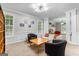 Cozy living room with large windows, comfortable seating, and modern decor at 155 Carrolls Way, Fayetteville, GA 30215