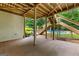 Covered patio area with view of pool providing an area to enjoy the outdoors and garden at 155 Carrolls Way, Fayetteville, GA 30215