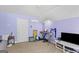 This bedroom with a bed, musical instruments and carpeted floor at 344 Mckibben Dr, Locust Grove, GA 30248