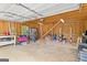 Large garage with storage, workbench, and workout area, providing ample space for hobbies and projects at 344 Mckibben Dr, Locust Grove, GA 30248