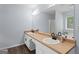 Large bathroom featuring double sinks with matte black faucets and modern finishes at 320 Cobb Ct, Hampton, GA 30228
