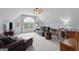 Spacious bonus room featuring ample seating, a unique ceiling, and tons of natural light at 320 Cobb Ct, Hampton, GA 30228