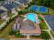 An aerial view features community amenities like pool, clubhouse, tennis courts, and green spaces at 2047 Gazebo Ln, Snellville, GA 30078