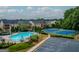 An aerial view features a pool, tennis courts, and clubhouse amenities, with parking at 2047 Gazebo Ln, Snellville, GA 30078