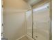 Modern bathroom stall with glass door and a window at 2047 Gazebo Ln, Snellville, GA 30078