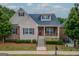 Charming brick and siding home with landscaped front yard and inviting front porch at 2047 Gazebo Ln, Snellville, GA 30078