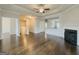 Living room features open concept and fireplace with hardwood floors at 2047 Gazebo Ln, Snellville, GA 30078