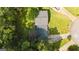 Top-down aerial view showcasing the roof, driveway, and surrounding greenery at 1486 Harbour Oaks Rd, Tucker, GA 30084