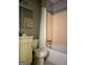 Bathroom with a shower, toilet, vanity and mirror at 1486 Harbour Oaks Rd, Tucker, GA 30084