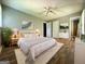 Bedroom with bed, rug, wood floors, and ceiling fan at 1486 Harbour Oaks Rd, Tucker, GA 30084