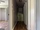Hallway leading into rooms with wood floors at 1486 Harbour Oaks Rd, Tucker, GA 30084