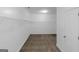Walk-in closet with door, shelving and carpet flooring at 185 Stewart Glen Dr, Covington, GA 30014