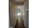 Hallway with closet and natural light shining from the backyard at 5579 Marbut Rd, Lithonia, GA 30058
