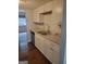 Well-equipped kitchen with granite countertops, white cabinets, and stainless steel appliances at 5579 Marbut Rd, Lithonia, GA 30058
