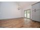 Hardwood floors are the center attraction of this living area with a view to the landscaped backyard at 5525 Belle Meade Dr, Villa Rica, GA 30180