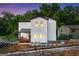 Charming newly constructed two-story house with a cozy front porch and landscaped yard at 2328 Lakewood Ave Sw, Atlanta, GA 30315