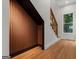 Hallway featuring custom wood design and natural light from the windows at 2328 Lakewood Ave Sw, Atlanta, GA 30315