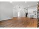 Spacious living area featuring modern lighting and open access to the modern kitchen at 2328 Lakewood Ave Sw, Atlanta, GA 30315