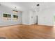 Expansive living room with wood floors, recessed lighting, and large windows offering ample natural light at 2328 Lakewood Ave Sw, Atlanta, GA 30315