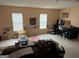 Spacious playroom with learning charts, desk, bean bag chair, and bright windows at 740 Pebble Blvd, Covington, GA 30016