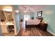 Bright bedroom with an ensuite bathroom and a sliding glass door at 155 Cottage Club Dr, Locust Grove, GA 30248