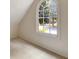 Bright room features a large window with neighborhood views, allowing for an abundance of natural light at 185 Newfield Dr, Tyrone, GA 30290