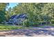 Charming clubhouse with landscaped grounds, inviting community amenities, and a welcoming neighborhood atmosphere for relaxation at 185 Newfield Dr, Tyrone, GA 30290