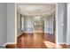 Open dining room features hardwood floors and views of the kitchen, perfect for entertaining at 185 Newfield Dr, Tyrone, GA 30290