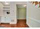 Entryway featuring hardwood flooring, a closet and view to the stairs at 185 Newfield Dr, Tyrone, GA 30290