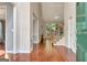 Inviting foyer with hardwood floors and stairway at 185 Newfield Dr, Tyrone, GA 30290