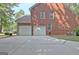 Three-car garage and wide driveway for easy parking at 185 Newfield Dr, Tyrone, GA 30290