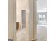 Hallway view to bathroom, bedroom, and windows allowing for great natural lighting at 185 Newfield Dr, Tyrone, GA 30290