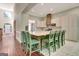 Spacious kitchen with island seating, custom hood and white cabinets at 185 Newfield Dr, Tyrone, GA 30290