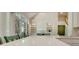 Open kitchen featuring a center island, custom cabinets, and view to the great room at 185 Newfield Dr, Tyrone, GA 30290