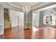 Bright and open living room with hardwood floors and plenty of natural light at 185 Newfield Dr, Tyrone, GA 30290