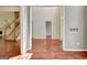 Inviting living room with hardwood floors, open floor plan and a staircase at 185 Newfield Dr, Tyrone, GA 30290