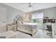 Bedroom with ceiling fan, and natural light, complemented by a cozy desk and dresser at 505 Lighthouse Ln, Peachtree City, GA 30269