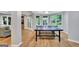 Basement game room with ping pong table, a view to a covered patio, and access to the living room at 505 Lighthouse Ln, Peachtree City, GA 30269