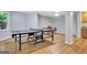 Spacious basement game room featuring light filled windows and a professional ping pong table at 505 Lighthouse Ln, Peachtree City, GA 30269