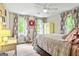Bright bedroom with natural light and decorative curtains at 135 Crimson Rdg, Tyrone, GA 30290